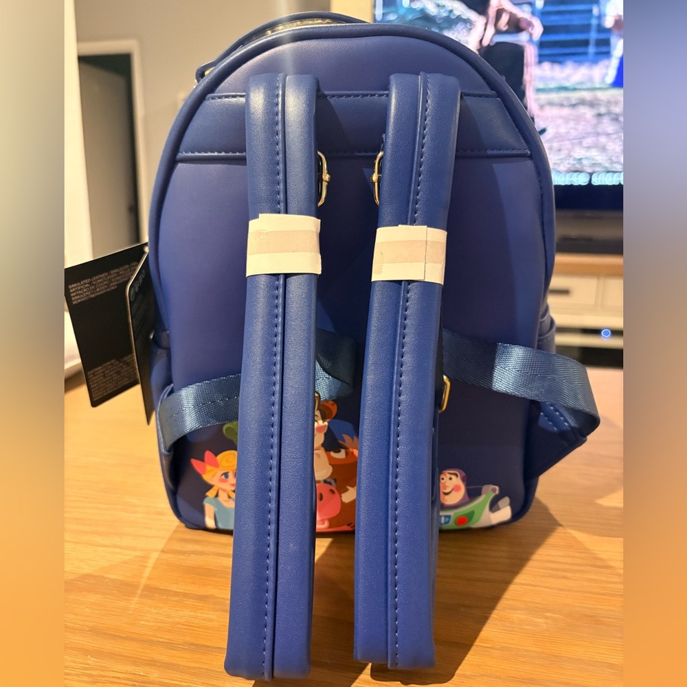 Loungefly Pixar Woody and Bo Backpack - Picture 2 of 7